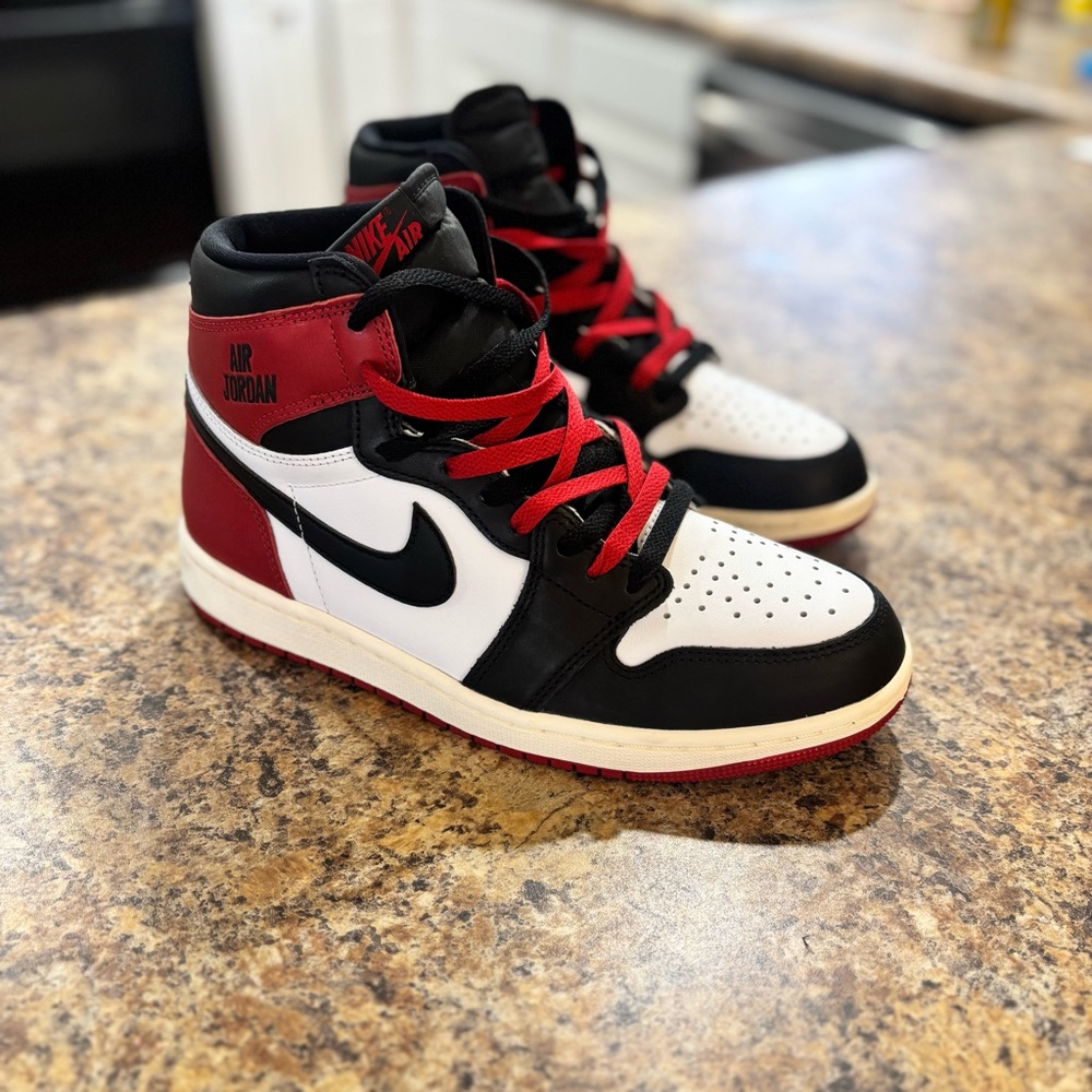Jordan High-Top Sneakers in Black, White, and Red